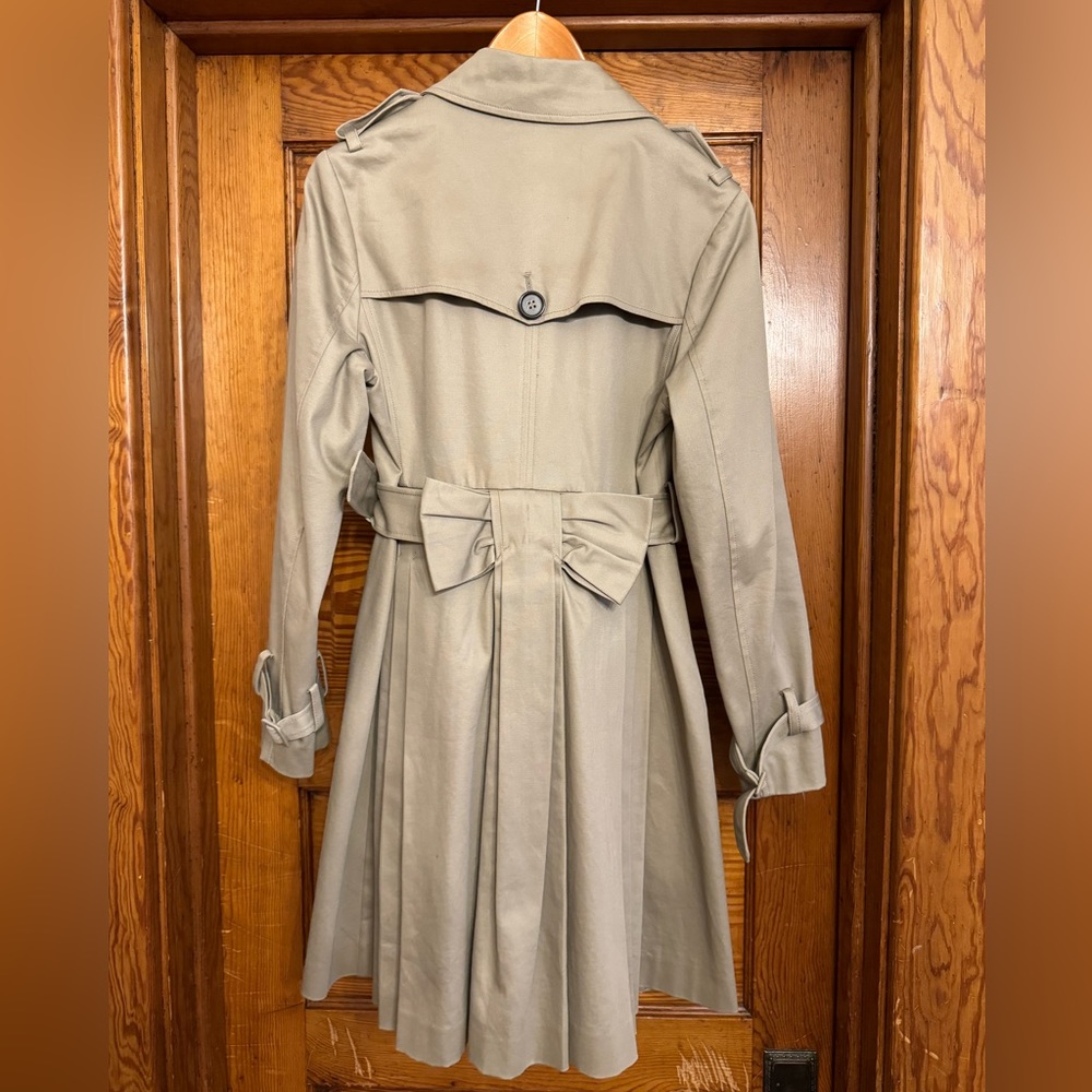 Sinclaire 10 retro trench coat with bow detail